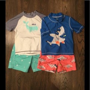 2 sets of Carter’s Boys swim suits. 24 months.
